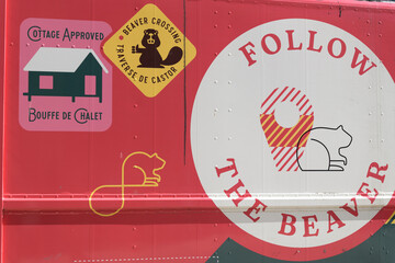 Fototapeta premium close-up, side, of Follow The Beaver or Canadian food‑truck brand BeaverTails (Queues de Castor), at a fan event at Nathan Phillips Square, Toronto