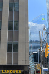 Naklejka premium exterior building and sign of Cafe Landwer (165 University Av) and distant view of TD Terrace north elevation - looking south on University Av from Adelaide St W, Toronto