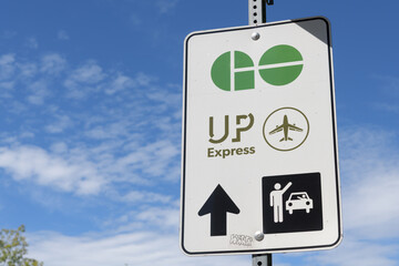 Fototapeta premium close-up of GO Transit, UP Express sign near Bloor Av W, Toronto