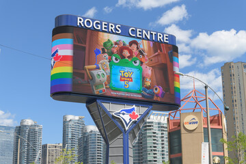 Fototapeta premium Toronto Rogers Centre Gardiner LED Pylon (located at Rees St & Bremner Blvd) with advertisement for Toy Story 5
