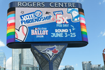 Fototapeta premium Toronto Rogers Centre Gardiner LED Pylon (located at Rees St & Bremner Blvd) with advertisement for Vote Phriendship ballot/Toronto Blue Jays (June 3-25)