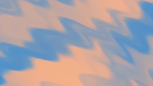 Abstract gradient background with soft blue and peach color swirls.