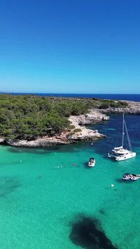 Aerial Drone Turquoise Water, Cala Turqueta Beach in Menorca Spain