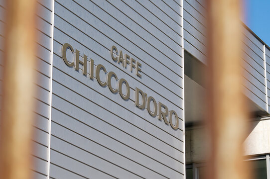 Caffe Chicco d'Oro corporate logo sign close up on headquarters building in Balerna, Switzerland
