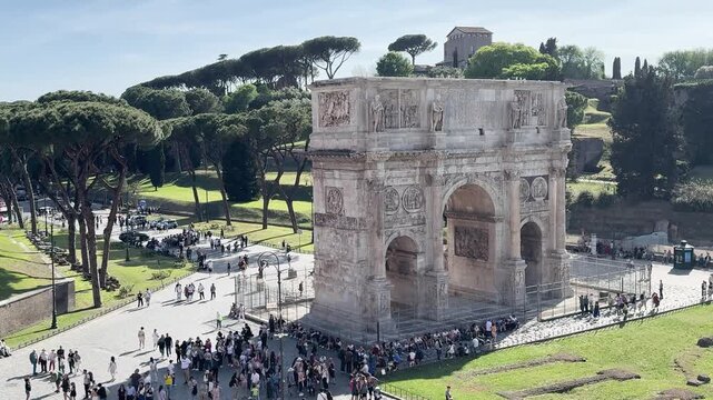 Elevated View of Arch of Constantine in Rome with Tourists