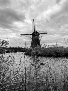 The windmills of Kinderdijk, in the province of South Holland, Netherlands. Nineteen beautiful windmills, built around 1740, stand here as part of a larger water management system to prevent floods.