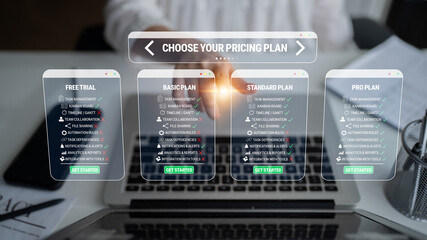 Interactive Screen Displaying Pricing Plans for Online Services with Free, Basic, Standard, and Pro...
