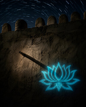 A traditional dark Omani shadow clock casts a perfectly still glowing cyan lotus shadow against a rushing blurred time-lapse star sky.