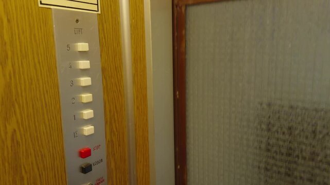 Vintage Elevator Control Panel With Floor Buttons And Wooden Interior. Retro Tech Infrastructure 