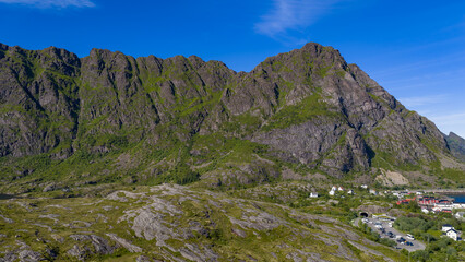 Fototapeta premium Lofoten Islands Mountain Panorama with Coastal Village Norway