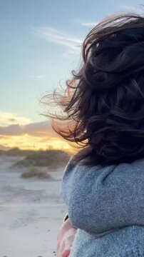 Relationship people man and woman hugging in love. Happy romantic adult couple in love enjoy sunset at the beach in outdoor romance leisure activity together during summer holiday travel vacation