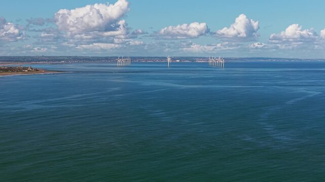 Offshore wind farm in the North Sea showing renewable green energy generation