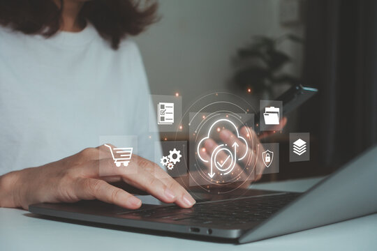 Businesswoman using laptop migrate file system, network and internet, storage and data transfer with cloud technology. connection and exchange of data documents, document management and folder privacy