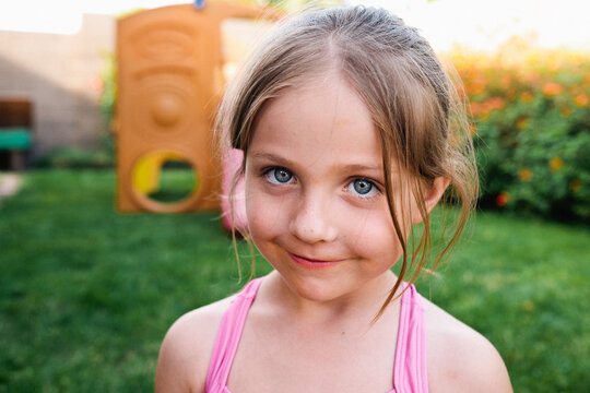 portrait of a girl in backyard