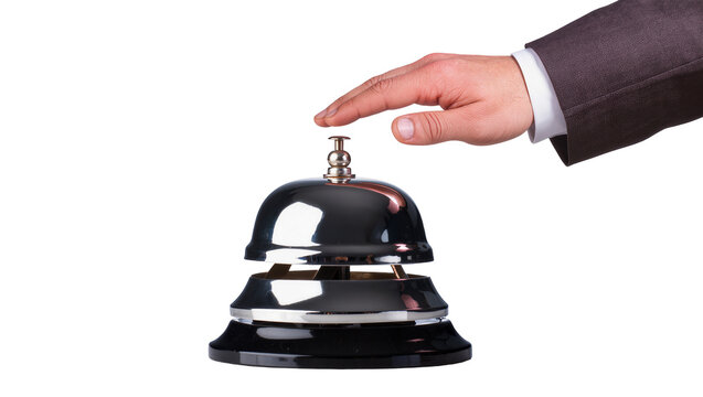 Isolated hand pressing a shiny metal service bell, symbolizing customer assistance and hospitality