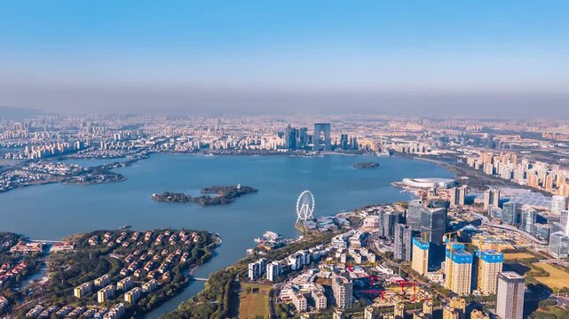 Panoramic aerial timelapse of the skyline of Jinji Lake City in Suzhou, Jiangsu Province, China