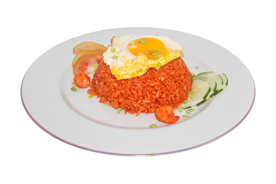 Indonesian spicy fried rice with sunny side up egg, isolated on transparent background