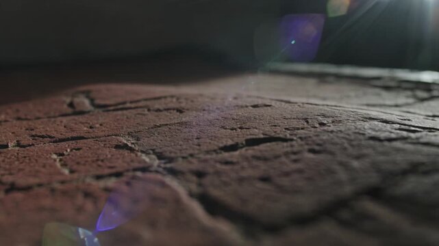 Cracked Surface Macro With Lens Flare And Warm Light