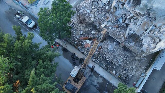 Aerial drone view of building demolition and redevelopment on David Street, urban renewal, פינוי בינוי, and תמא 38 construction activity.