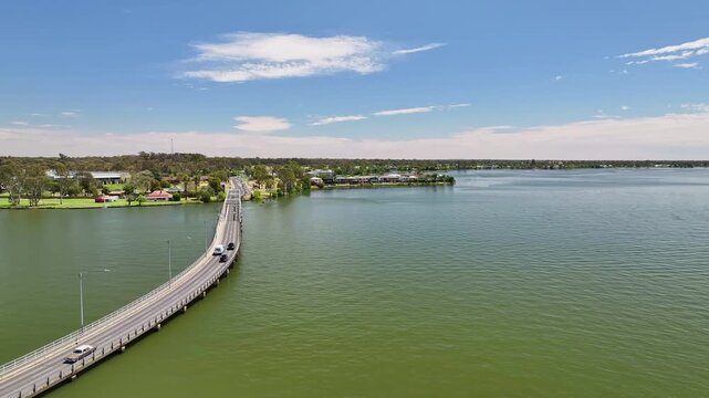 Road bridge stretches across Lake Mulwala toward Mulwala homes