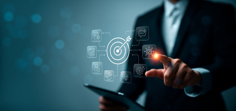 Business strategy target achievement concept with professional using tablet and digital interface showing connected workflow icons for AI automation data analytics innovation and process optimization