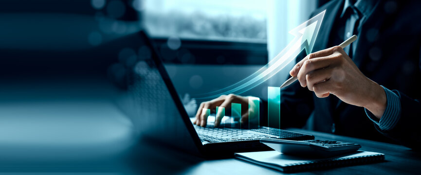 Business financial growth concept with professional using laptop and stylus showing rising arrow chart digital analytics performance improvement and revenue strategy planning