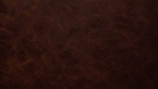 Dark brown leather texture close up detailed surface and grain
