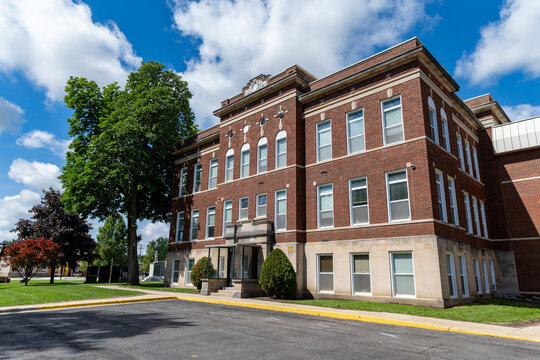 Sanilac County Courthouse Historic Brick Building Angled View with Trees and Blue Sky Michigan