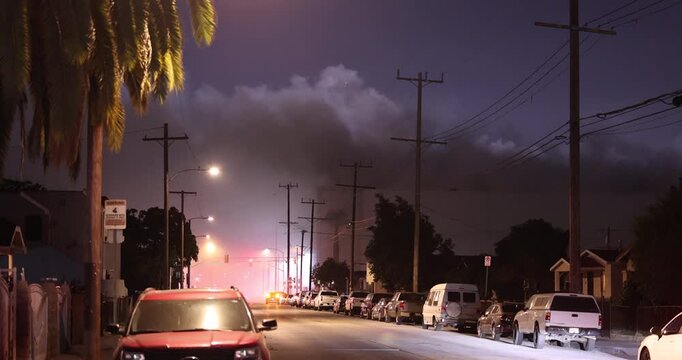 Los Angeles, California, USA - June 18, 2026: Toxic smoke billows out from a warehouse fire in the East LA Boyle Heights neighborhood. 