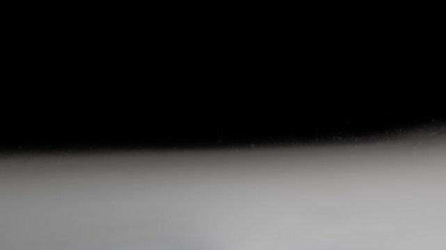 White smoke stays steady and covers half of the screen nonstop.