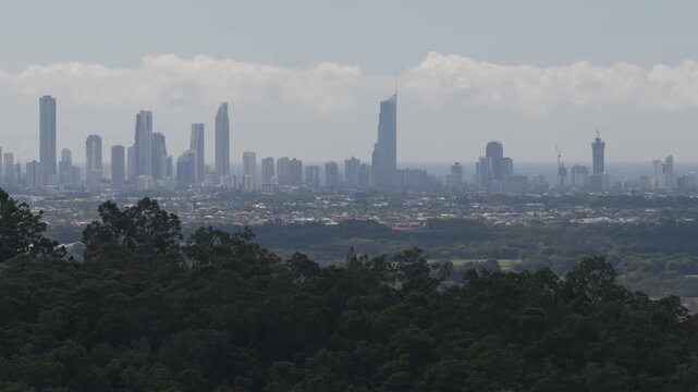 Gold Coast Hinterland Looking Towards Surfers Paradise City Skyline In Queensland, Australia. Wide Drone Shot