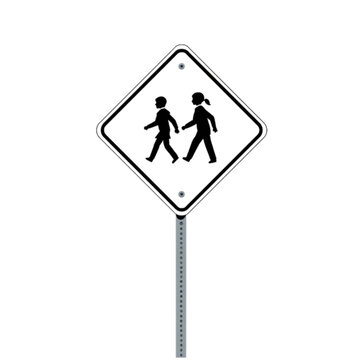 Children Crossing Sign: A black and white diamond-shaped road sign with silhouette figures of two children walking, indicating a pedestrian crossing, mounted on a metal post.