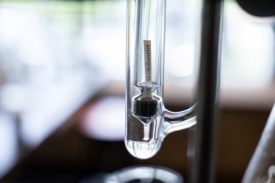 Alcoholometer glass laboratory measurement liquid transparent closeup scientific tool precision equipment distillation alcohol instrument chemistry technology vertical clean professional
