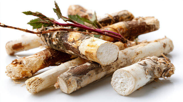 Harvested marshmallow root herbal medicine medicinal plant natural remedy dried root white background close up botany, cut marshmallow root pile
