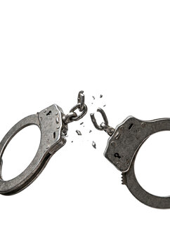 Broken metal handcuffs snapping in half