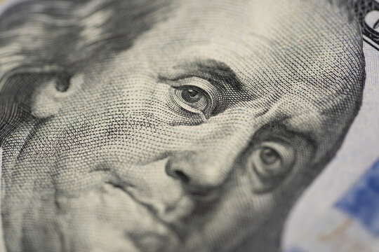 dollar bill macro Benjamin Franklin portrait. dollar money closeup US currency note. dollar engraving texture detail security pattern. dollar financial concept economy investment wealth.
