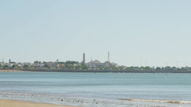 Timelapse at Playa Micaela with the city of Chipiona at the background
