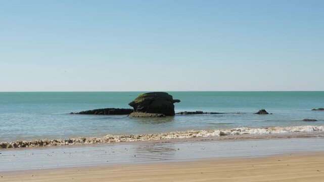 Ocean rocks at Playa Micaela near Chipiona, Cadiz, Spain