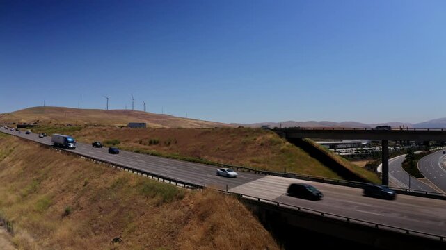 Drone view over wind turbines at the Altamont Pass Wind Farm near Dublin, California. Applicable to clean energy, environmental