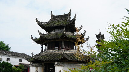 Obraz premium The Living Architecture Museum: The Grand Hui-Style Heritage of Xucun Village, Exploring the Imperial Arches and Historic Mansions, A National Cultural Relic Landmark in Huangshan, China