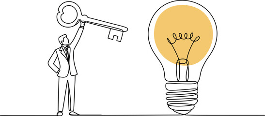 Naklejka premium Man in suit holding a key with one hand raised next to a lit light bulb on white background