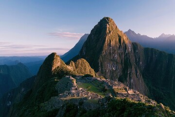 Naklejka premium Ancient South American terraced ruins nestled on a lush mountain saddle under golden morning light for travel and archaeology editorials