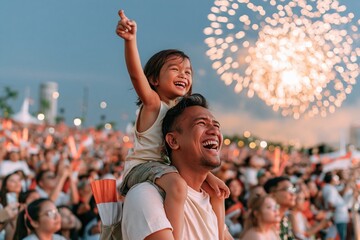 Malay Singaporean father carrying laughing child on shoulders at a humid fireworks display, candid summer celebration for family and travel