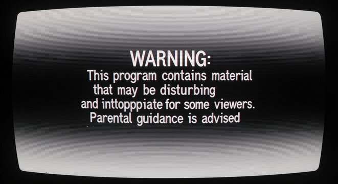 Parental guidance warning on television screen with disturbing content alert for sensitive viewers