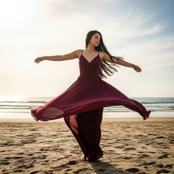 Graceful dance on the beach at sunset