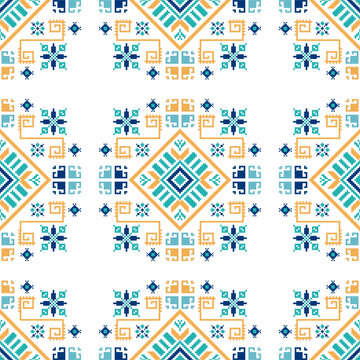 Seamless geometric folk pixel art pattern in orange teal and navy