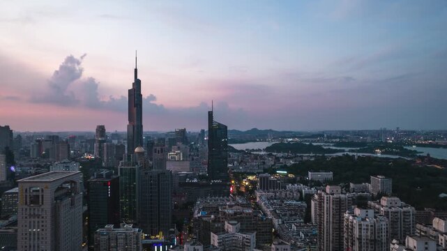 Nanjing China skyline at sunset with Zifeng Tower and Xuanwu Lake in Nanjing, Jiangsu, China