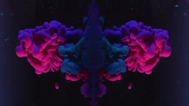 The dynamic fluid movement and sharp color contrasts create a cinematic visual with a psychedelic, Rorschach-style, or magical, calming smoke effect.