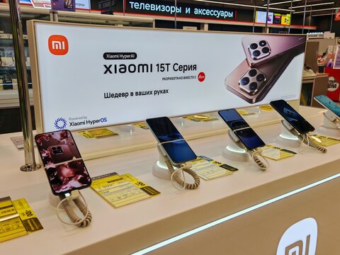 Belarus, Svetlogorsk, May 15, 2026. Xiaomi Smartphone Store Display. Modern retail store display of Xiaomi phones with large advertising banner and Leica branding. Technology showcase.