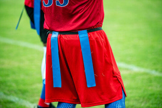 Parrtial view of tag on a flag football player